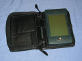The carry pouch open.  On the right is the MessagePad with a variety of card holders on the left. - mp2000-03.jpg