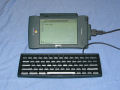The newton with the screen rotated is propped up on its lid and the keyboard attached. - mp2000-08.jpg