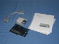Contained in the box is the card, Y-cable for joystick and floppy drive, software disks, and manuals. - iie-card-02.jpg