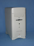 The front of the system features a CD-ROM drive, floppy drive, IR receiver, volume control, and headphone socket. - pm6400-01.jpg