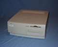 The front of the system unit with the auto-inject floppy drive and tray load CD-ROM drive.  There is also available a alternate bezel so a removable media drive can be installed to the left of the CD-ROM. - pm7200-01.jpg