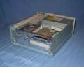 With the top cover removed the hard drive adjacent to the floppy drive can be seen. - pm7200-03.jpg